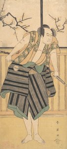 Le troisième Sawamura Sojuro en homme debout dans une pièce, vers 1793