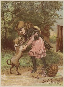 Fille jouant avec un chien